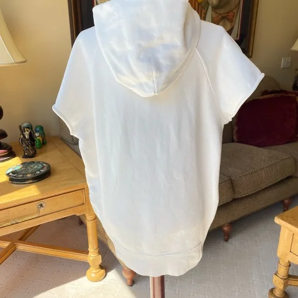 Fear of God FOG medium white short sleeve hoodie. Front pocket, side zippers.